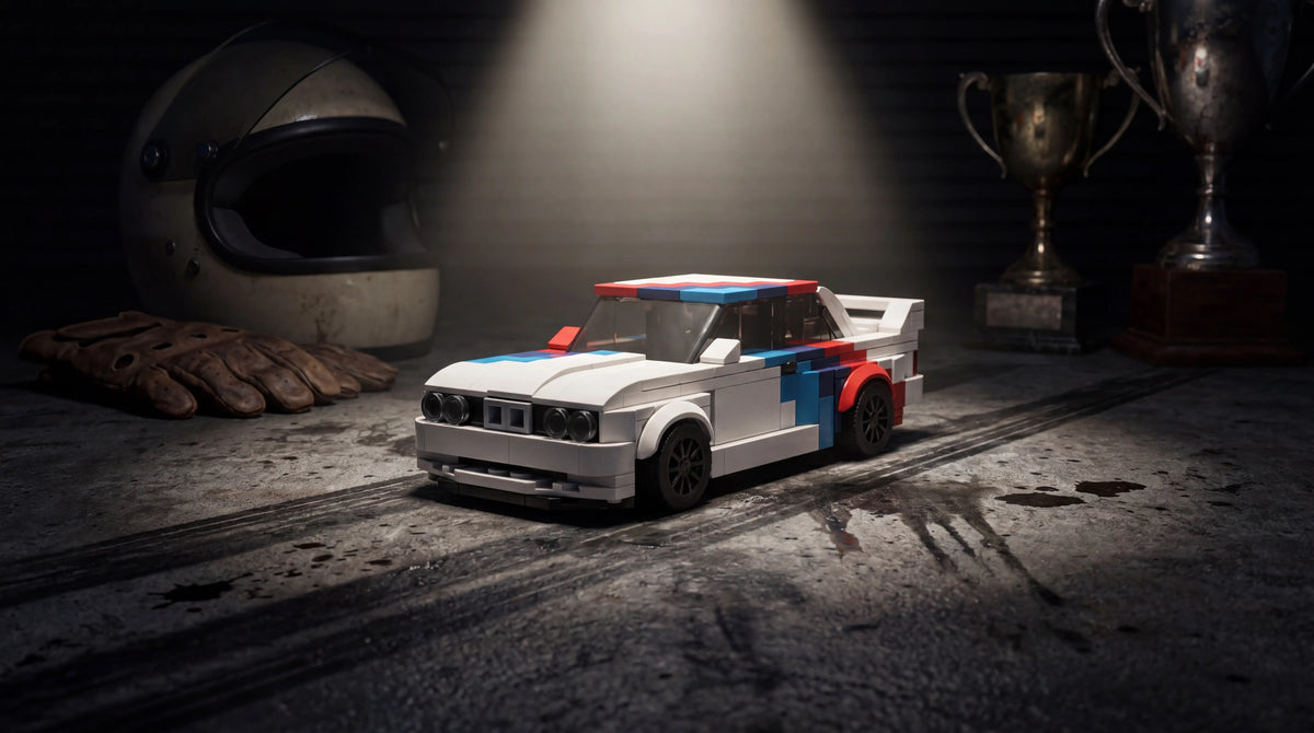 BMW M3 E30 1:24 scale LEGO-compatible brick building kit in racing garage — Rova LEGO BMW M3 building kit covering every M3 generation E30 E46 M4