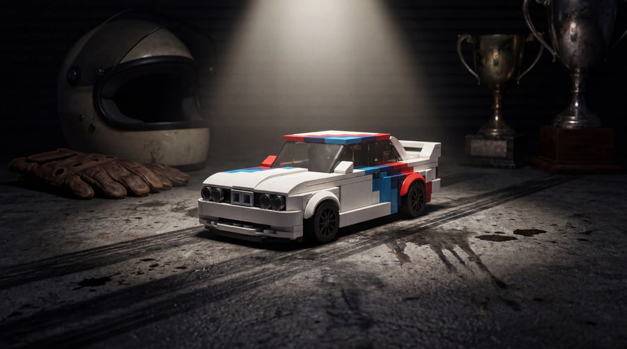 BMW M3 E30 1:24 scale LEGO-compatible brick building kit in racing garage — Rova LEGO BMW M3 building kit covering every M3 generation E30 E46 M4