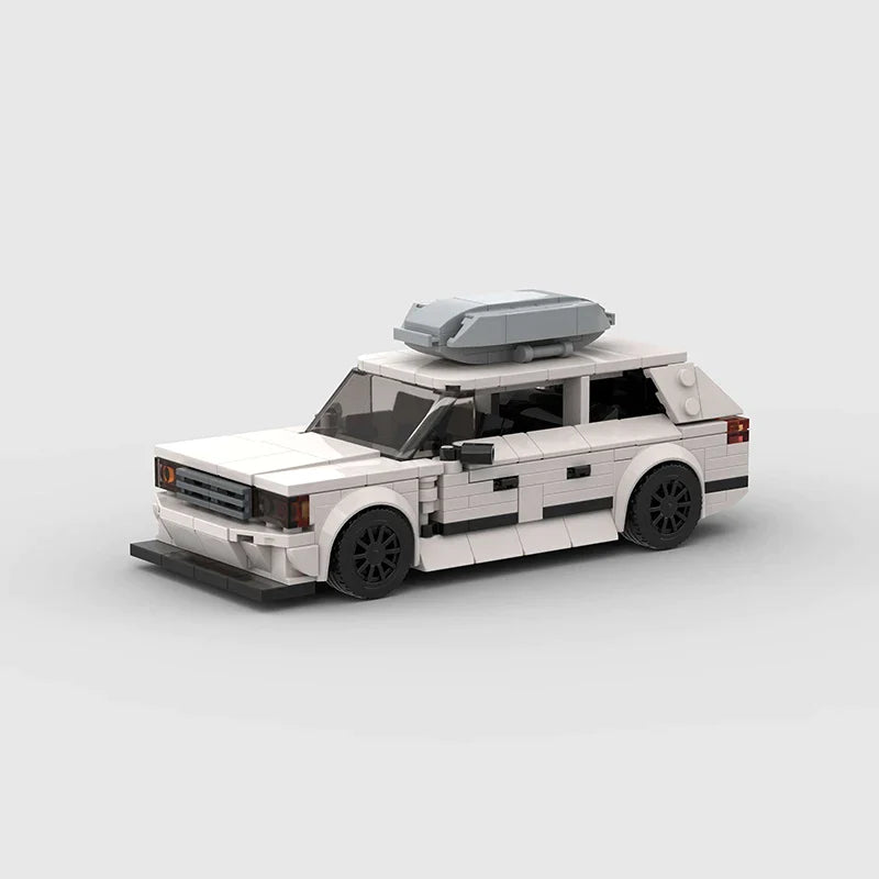 Mercedes Benz S124 Building Kit — Side View | Rova
