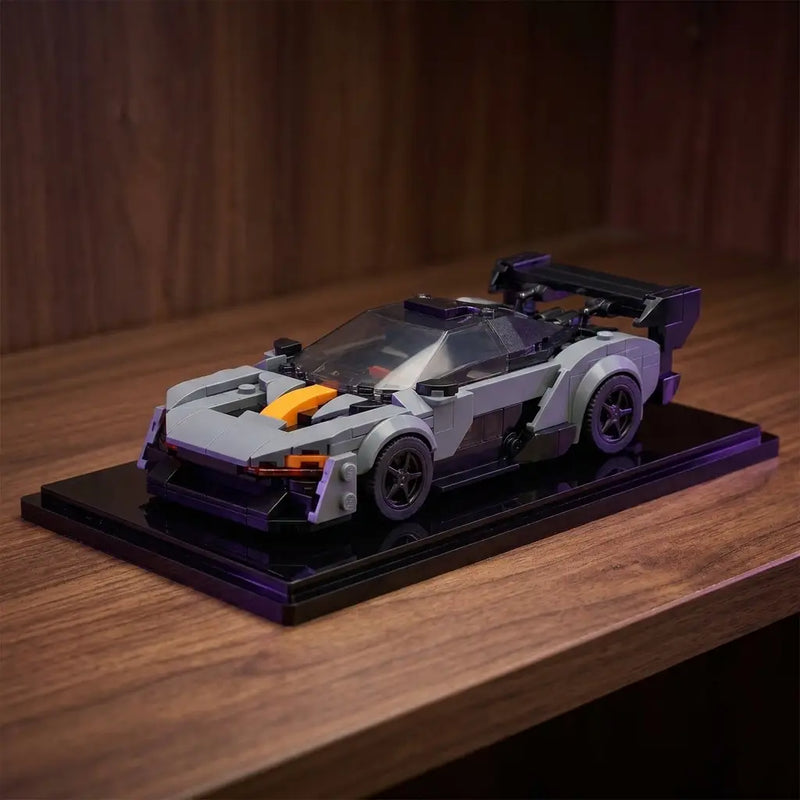 Rova McLaren Senna LEGO-compatible brick model on premium display stand — display-grade finish, satin ABS bricks, collector shelf presentation