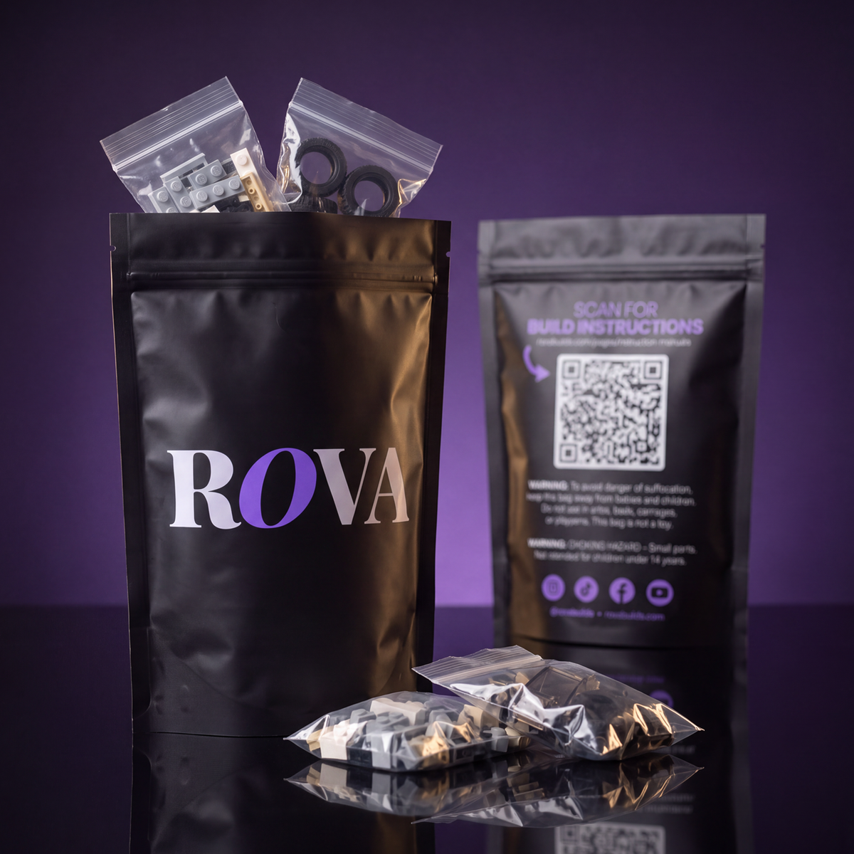 Rova packaging: matte black resealable pouch, front and back, with sealed bags of building bricks